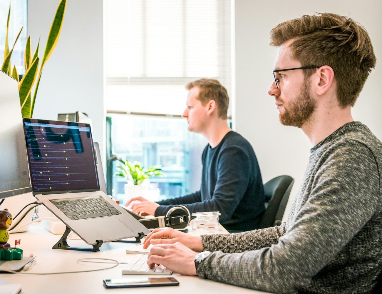 CSR Group technicians working at their desks