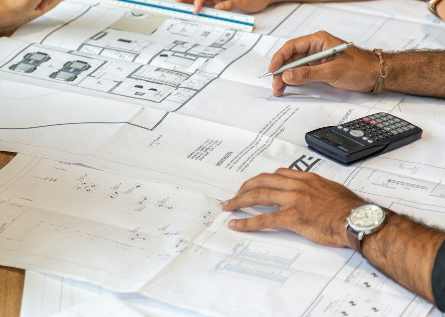 Engineer drafting a building plan