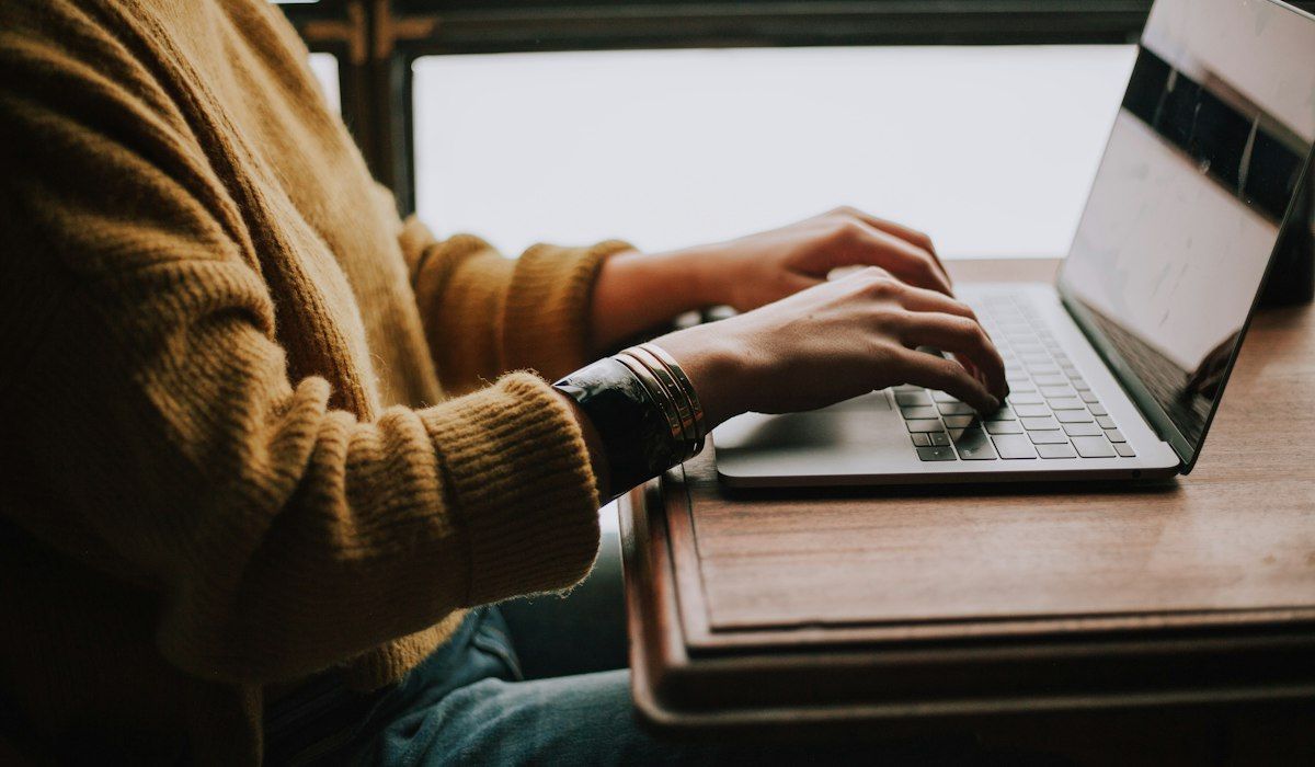 Person using a laptop at home